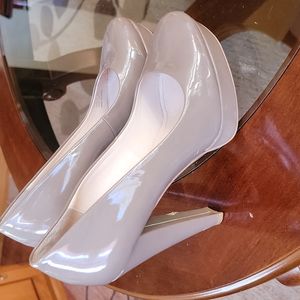High heel shoes. Size 8.   Heel is 4 ". calvin klein Taupe.
